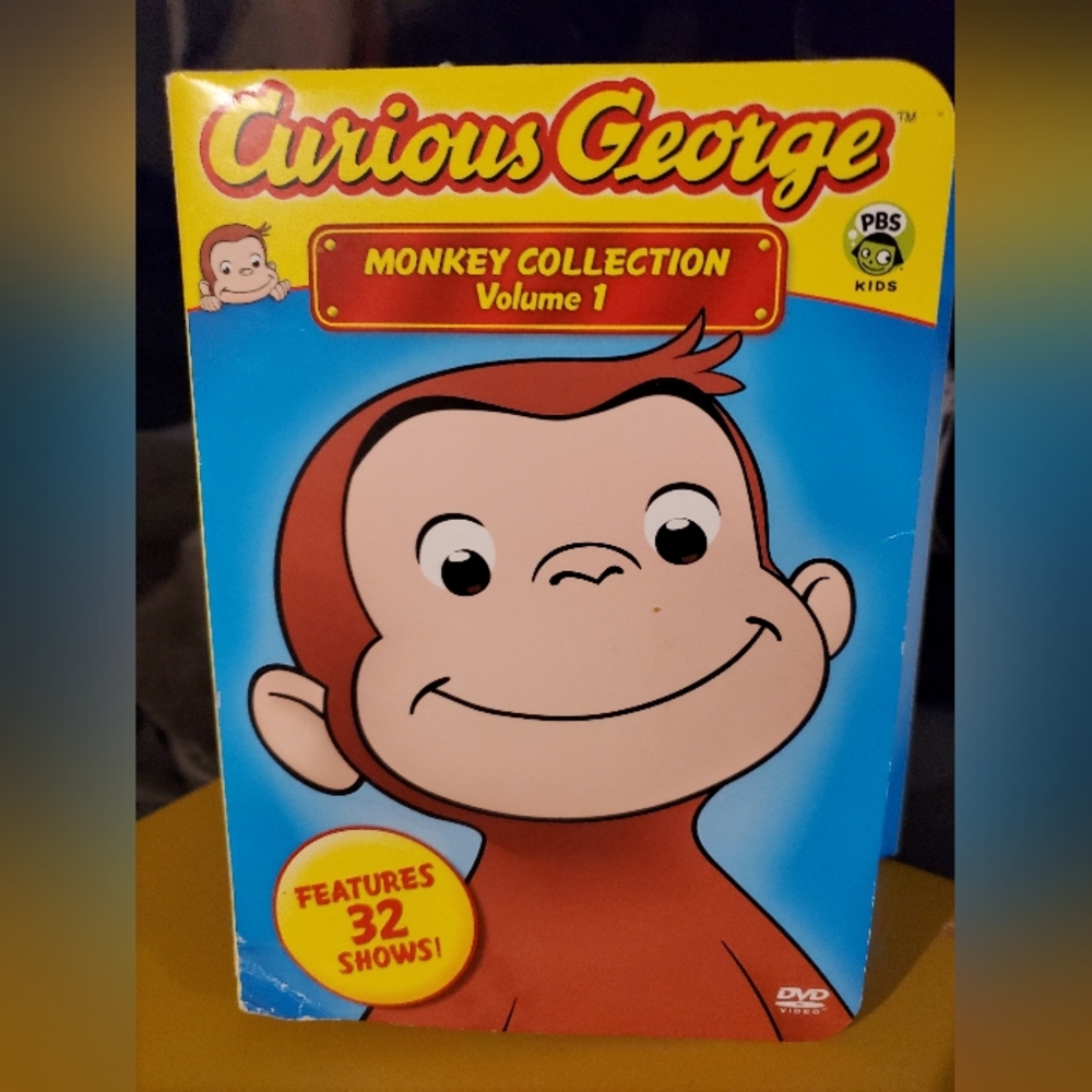 Boxed set of Curious George 4 DVDs $15